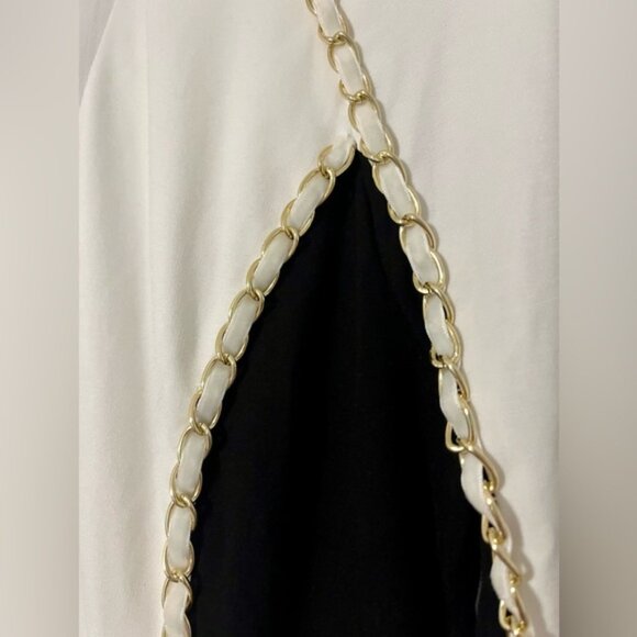 NWOT bebe Black and White Long-Sleeved Knee-Length Dress with Gold Chain Accent - Picture 5 of 8